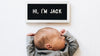 The Letterfolk Letter Board with a baby below it.