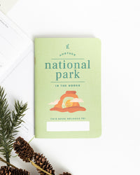 Kids National Park Passport on a themed background