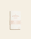 Everyday Checklist Notebook on a cream background