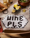 The Letterfolk Placemat on a dining table setting.