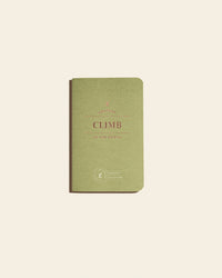 Climb Passport on a cream background