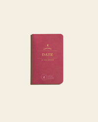 Date Passport on a cream background