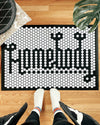 An image of a person standing over the Letterfolk White Tile Mat