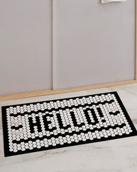 The Letterfolk  White Tile Mat displayed on a white background.