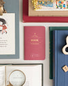 Book Passport on a themed background