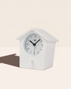 The Early Bird Alarm Clock in White on a cream background. 
