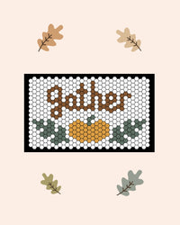 The Gather Round November Design of the Month on a tile mat on a cream background. 