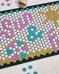 The Letterfolk Make Magic Tile Bundle in a Tile Mat Design on a white surface. 