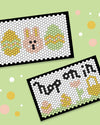 The Letterfolk Easter Tile Set on a Tile Mat on a mint background. 