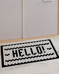 The Letterfolk  White Tile Mat displayed on a white background. 